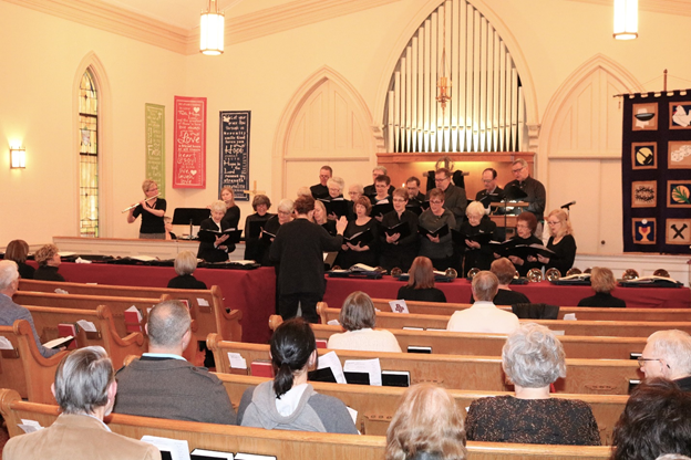 The choirs from First Congregational Church and St. Paul’s Lutheran Church singing together during the 2019 joint Good Friday service by both congregations at FCC