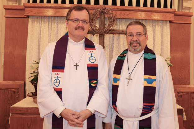 First Congregational Church Pastor Dave Forsberg, left, and Pastor Alan Casillas of St. Paul’s Lutheran Church following the 2019 joint Good Friday Service held by the two churches at FCC